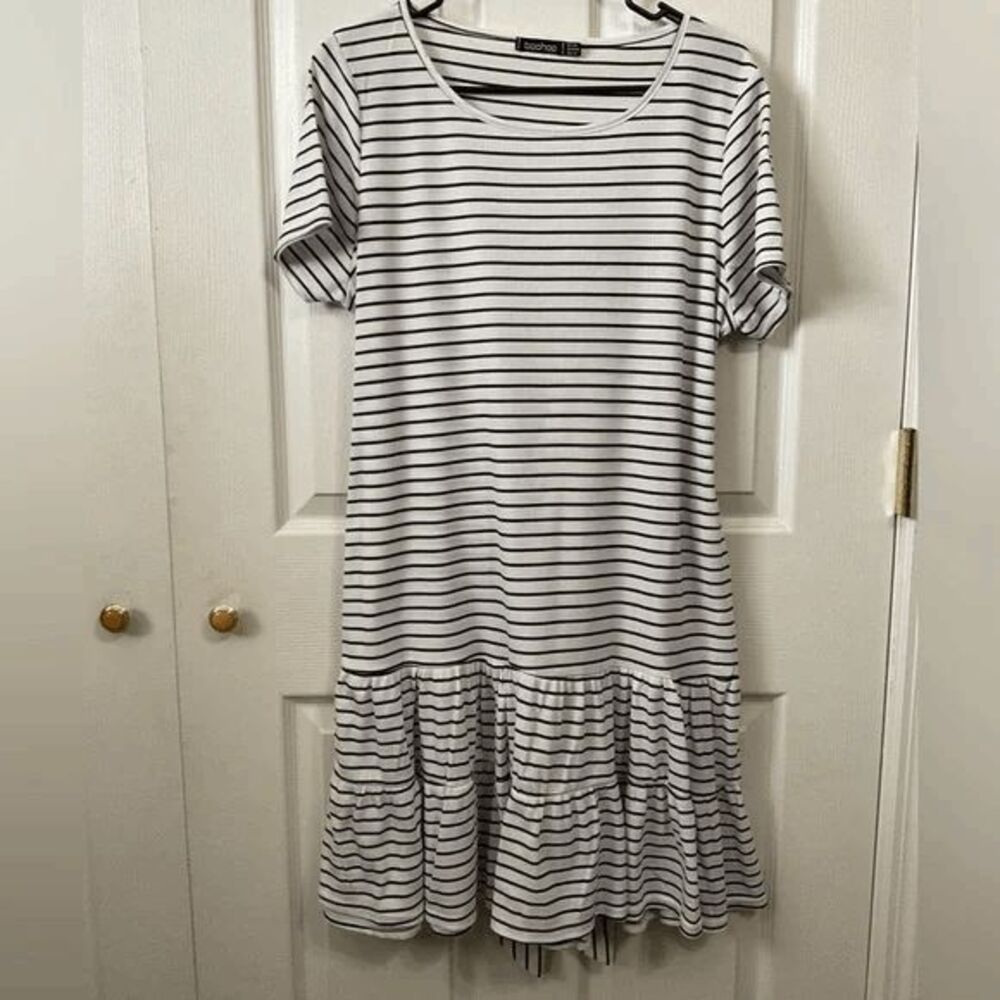Boohoo black and white stripped dress. Size 14. Ruffled skirt.